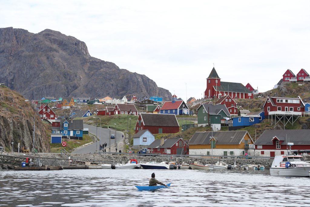Greenland Kayaker in approaches township