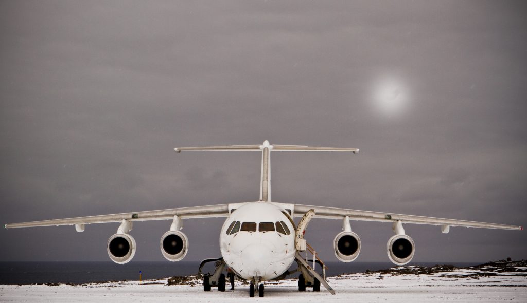 Antarctica flight plane waits on the tarmac