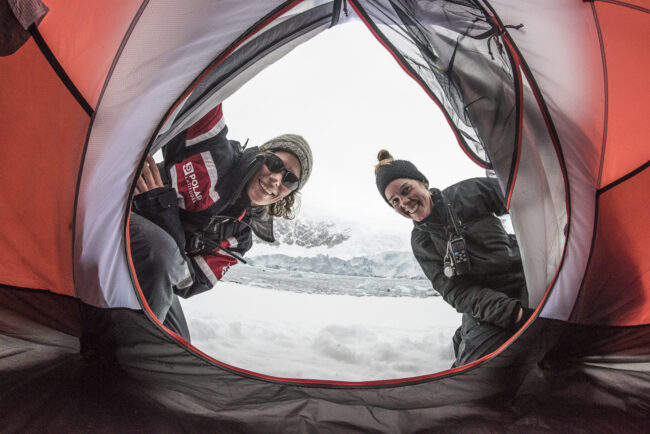 campers look in tent